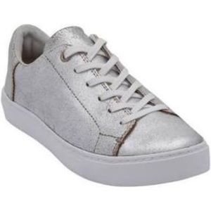 Tom’s silver sneakers